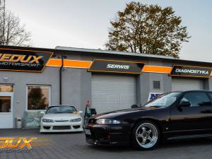 Projekt warsztatu oraz loga Redux Motorsport